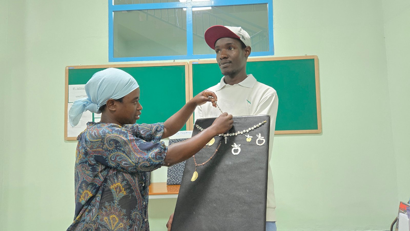 Students demonstrating jewelry craftsmanship