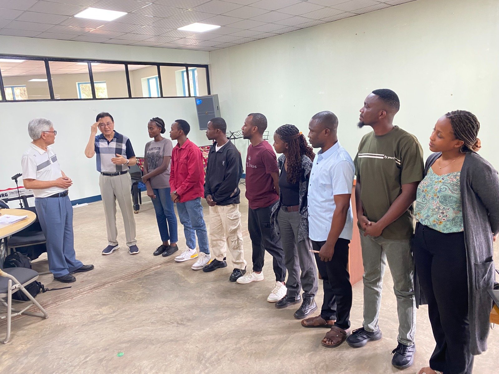 UAIT students listening during the fellowship with Pastor Ryu Cheol-bae