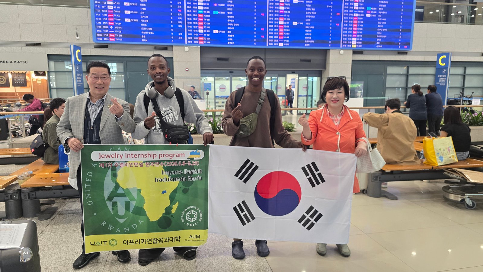 IMPANO Parfait and Neria IRADUKUNDA at South Korea airport with UAIT members