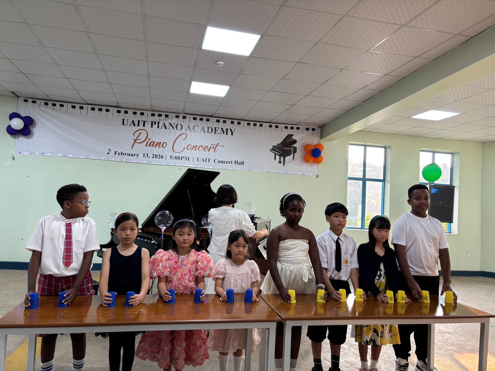 Students lined up for cup stacking activity